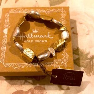 Gold and silver stretch bracelet.